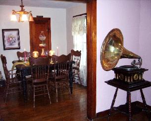 For those who prefer a formal dining area to have their breakfast, we offer you this dining room. Your order is served on a spacious carved solid oak table. If wanted, one can enjoy vintage music with their food. Maximum seating capacity is six.